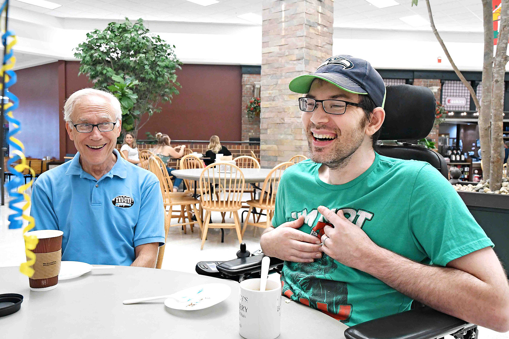 Men's coffee group gives birthday surprise